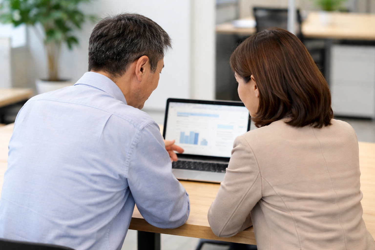 looking at a laptop together